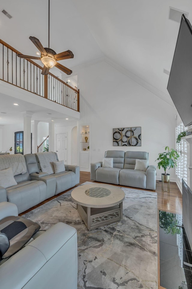 1918 Mosaic Trl, Murfreesboro, TN 37130 - living room with high vaulted ceiling, ceiling fan, wood finished floors, and baseboards