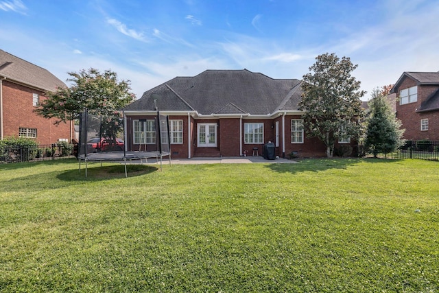 1918 Mosaic Trl, Murfreesboro, TN 37130 - rear view of property with a trampoline, french doors, a patio, and brick siding