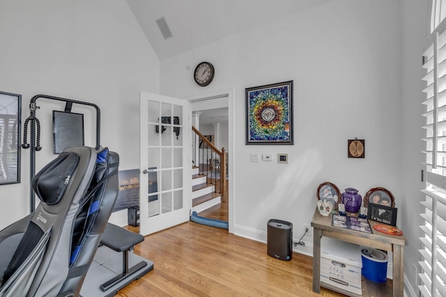 1918 Mosaic Trl, Murfreesboro, TN 37130 - exercise room featuring high vaulted ceiling, wood finished floors, french doors, and baseboards