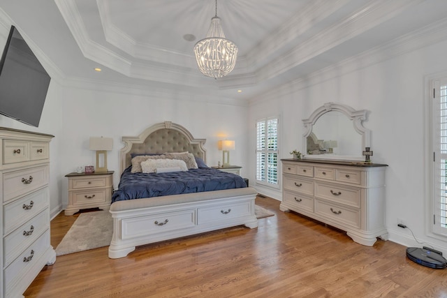 1918 Mosaic Trl, Murfreesboro, TN 37130 - bedroom featuring light wood-type flooring, a chandelier, a raised ceiling, and crown molding