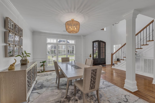1918 Mosaic Trl, Murfreesboro, TN 37130 - dining space with a decorative wall, decorative columns, stairs, ornamental molding, and a chandelier