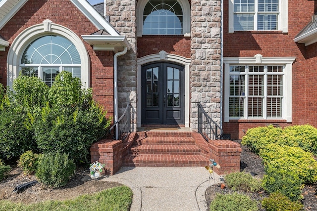 1918 Mosaic Trl, Murfreesboro, TN 37130 - doorway to property with french doors, brick siding, and stone siding