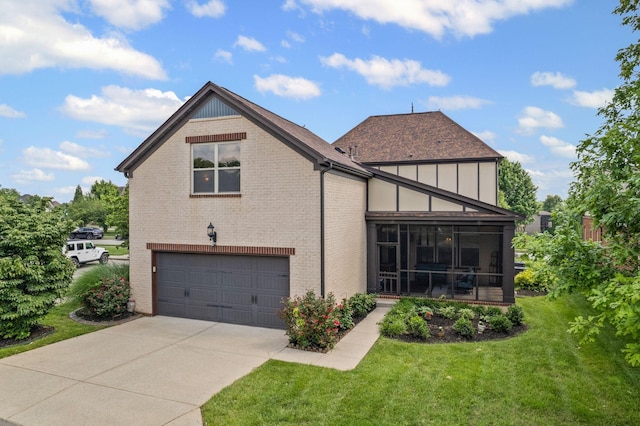 1638 Kelvington Blvd, Gallatin, TN 37066 - view of home's exterior with an attached garage, driveway, a lawn, a sunroom, and brick siding