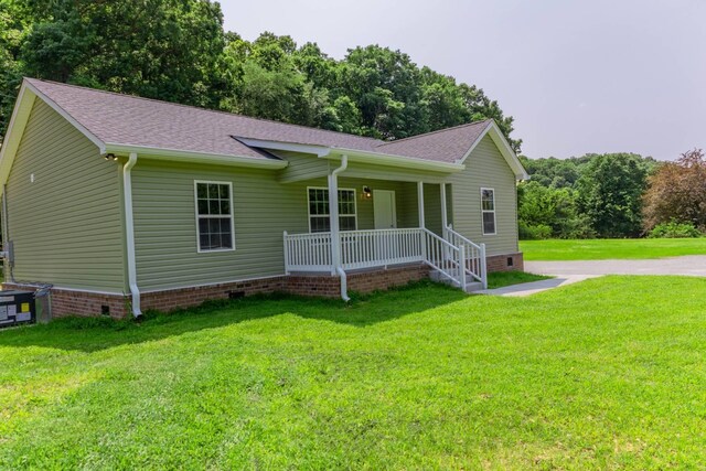 259 Longbranch Rd, Hohenwald, TN 38462 - ranch-style house with covered porch, crawl space, a front yard, and roof with shingles