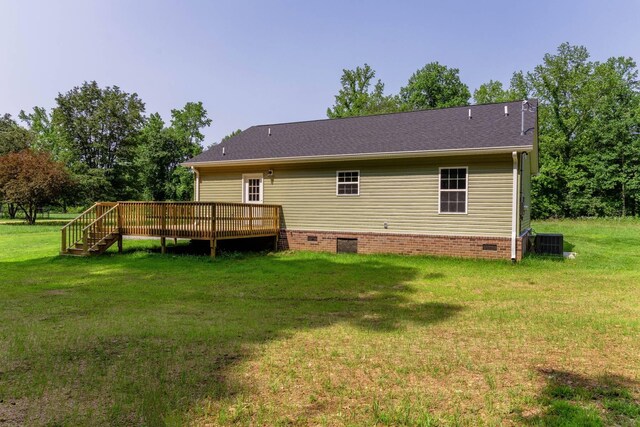 259 Longbranch Rd, Hohenwald, TN 38462 - rear view of house featuring crawl space, central AC unit, a wooden deck, and a yard