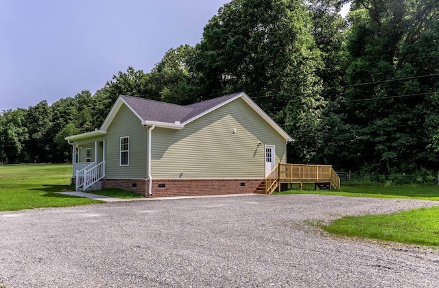 259 Longbranch Rd, Hohenwald, TN 38462 - view of side of home featuring crawl space, a lawn, a deck, and driveway