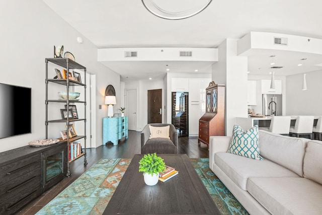 900 20th Ave S Unit 715, Nashville, TN 37212 - living room featuring dark wood-type flooring
