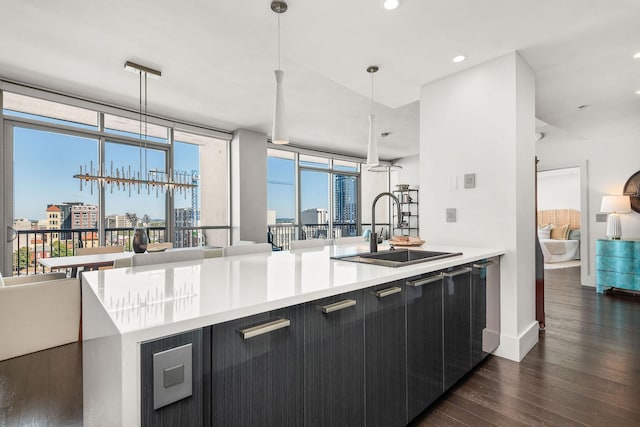 900 20th Ave S Unit 715, Nashville, TN 37212 - kitchen featuring a sink, dark wood-style floors, modern cabinets, light countertops, and a view of city