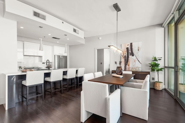 900 20th Ave S Unit 715, Nashville, TN 37212 - dining area featuring dark wood-type flooring and recessed lighting