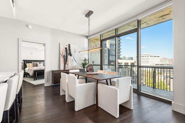900 20th Ave S Unit 715, Nashville, TN 37212 - dining area featuring dark wood finished floors, a view of city, and a wall of windows