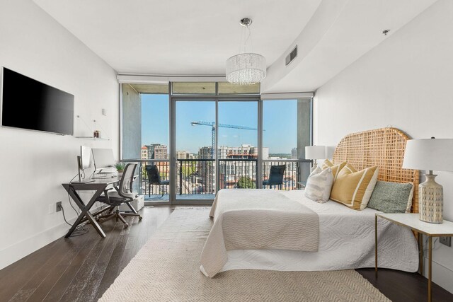 900 20th Ave S Unit 715, Nashville, TN 37212 - bedroom with floor to ceiling windows, access to exterior, wood finished floors, a view of city, and baseboards