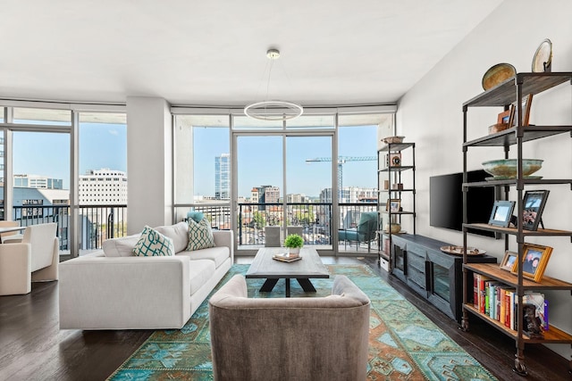 900 20th Ave S Unit 715, Nashville, TN 37212 - living area with a wall of windows, wood finished floors, and plenty of natural light