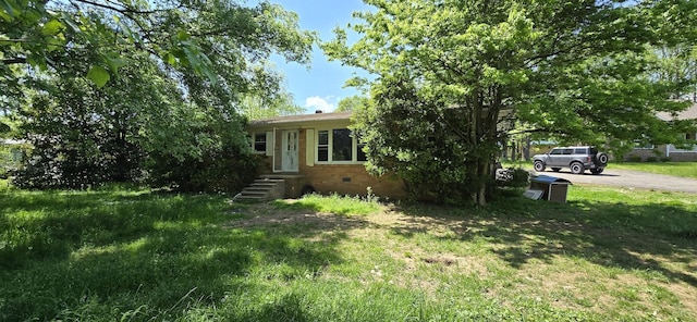 113 Brook St, Mc Ewen, TN 37101 - view of front of property with brick siding and a front yard