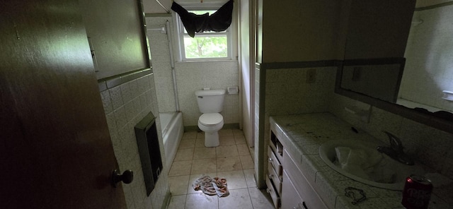 113 Brook St, Mc Ewen, TN 37101 - full bathroom with vanity, toilet, tile patterned floors, and tile walls