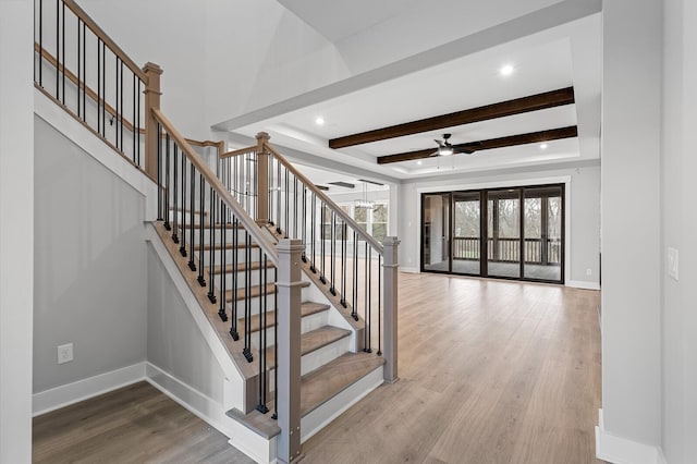 2736 Hartsville Pike, Castalian Springs, TN 37031 - stairs featuring ceiling fan, wood finished floors, baseboards, a raised ceiling, and recessed lighting