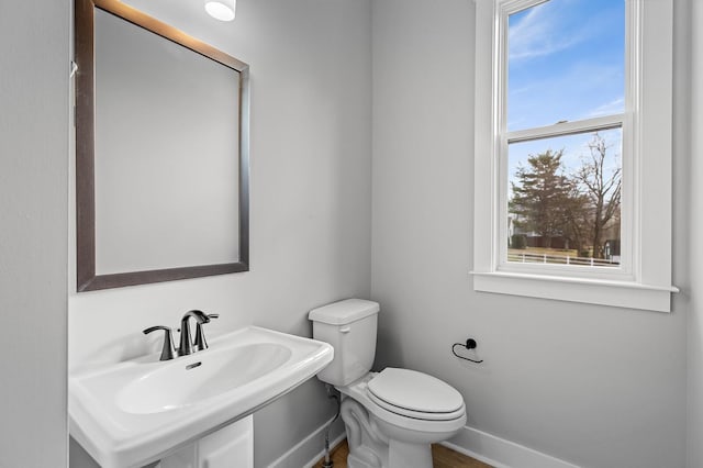 2736 Hartsville Pike, Castalian Springs, TN 37031 - bathroom with a sink, toilet, and baseboards