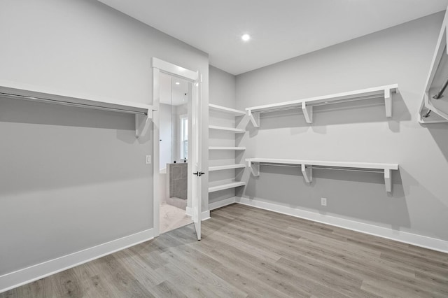 2736 Hartsville Pike, Castalian Springs, TN 37031 - walk in closet with wood finished floors