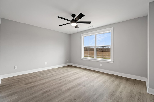 2736 Hartsville Pike, Castalian Springs, TN 37031 - spare room featuring wood finished floors, baseboards, and a ceiling fan