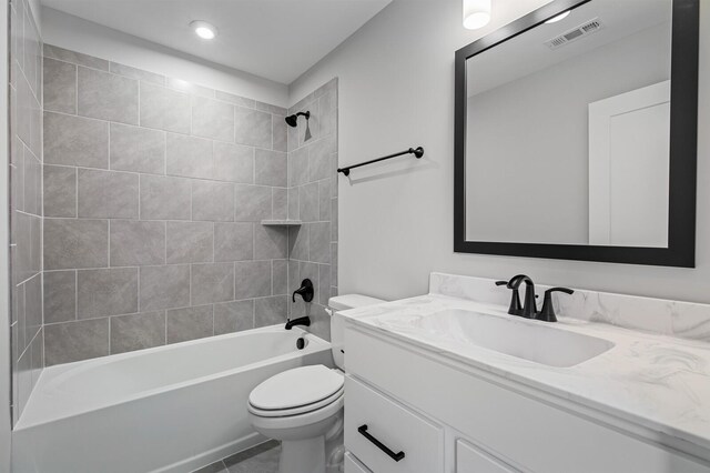 2736 Hartsville Pike, Castalian Springs, TN 37031 - full bathroom with toilet, vanity, washtub / shower combination, and tile patterned flooring