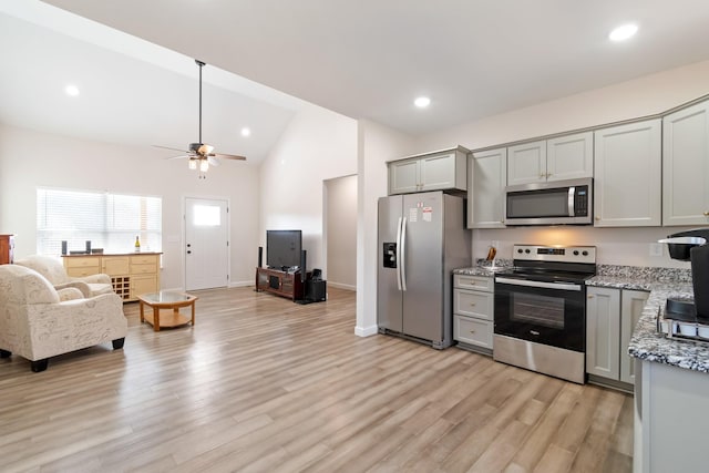 2800 N Hurricane Creek Rd, Mc Ewen, TN 37101 - kitchen featuring appliances with stainless steel finishes, gray cabinets, open floor plan, ceiling fan, and vaulted ceiling
