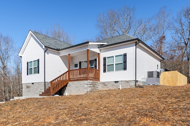 2800 N Hurricane Creek Rd, Mc Ewen, TN 37101 - view of front of house with crawl space, covered porch, and roof with shingles