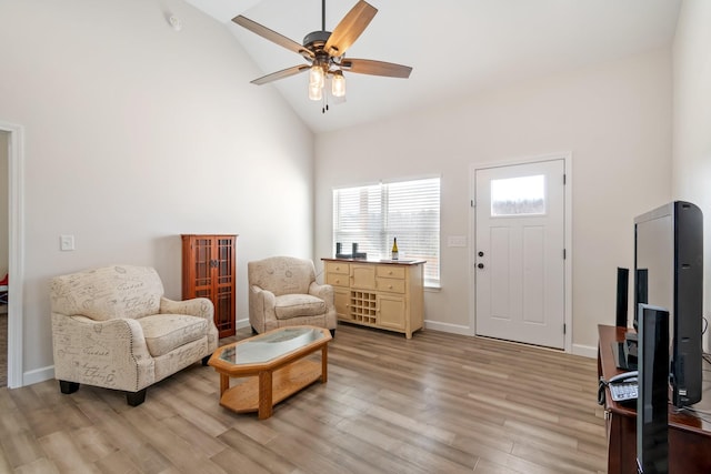 2800 N Hurricane Creek Rd, Mc Ewen, TN 37101 - living area featuring light wood-style floors, ceiling fan, high vaulted ceiling, and baseboards