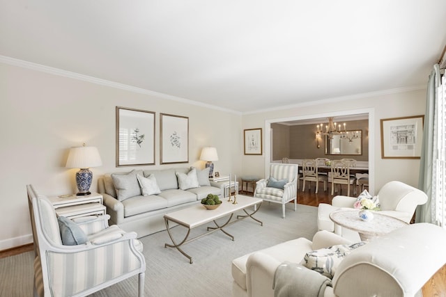 6116 Chickering Ct, Nashville, TN 37215 - living room with crown molding, a chandelier, wood finished floors, and baseboards