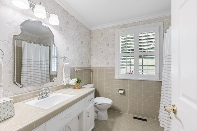 6116 Chickering Ct, Nashville, TN 37215 - bathroom with toilet, vanity, crown molding, wainscoting, and tile patterned floors