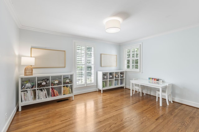 6116 Chickering Ct, Nashville, TN 37215 - playroom featuring crown molding, wood finished floors, and baseboards