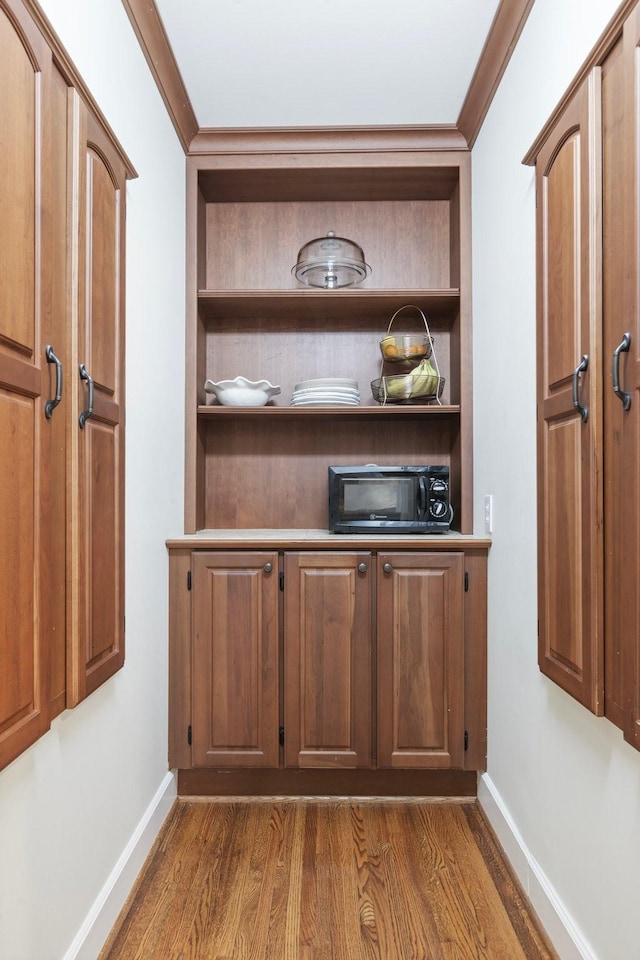 6116 Chickering Ct, Nashville, TN 37215 - unfurnished office featuring dark wood finished floors, baseboards, ornamental molding, and built in features