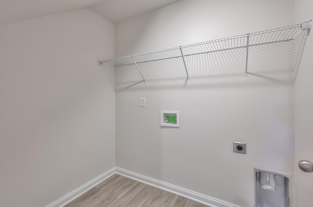 515 Cedar Brook Dr, White House, TN 37188 - washroom with hookup for a washing machine, light wood-type flooring, hookup for an electric dryer, and baseboards