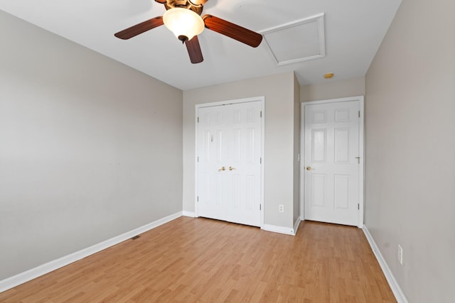 3401 Anderson Rd Unit 72, Antioch, TN 37013 - unfurnished bedroom with attic access, light wood-type flooring, baseboards, and a closet
