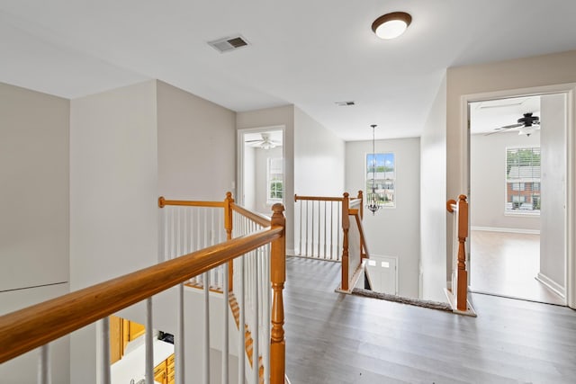 3401 Anderson Rd Unit 72, Antioch, TN 37013 - hallway featuring an upstairs landing, wood finished floors, and baseboards