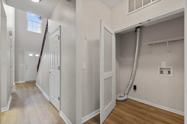 3401 Anderson Rd Unit 72, Antioch, TN 37013 - laundry area featuring light wood-type flooring, hookup for a washing machine, and baseboards