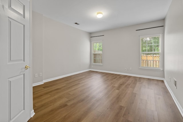 3401 Anderson Rd Unit 72, Antioch, TN 37013 - empty room featuring plenty of natural light, wood finished floors, and baseboards
