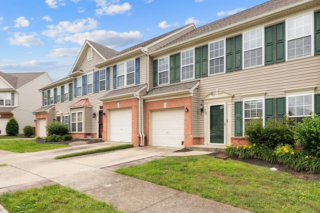3401 Anderson Rd Unit 72, Antioch, TN 37013 - multi unit property featuring brick siding, driveway, an attached garage, and a front yard