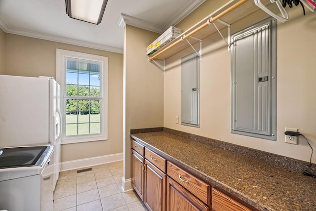 500 Old Pencil Mill Rd, Chapel Hill, TN 37034 - washroom with crown molding, baseboards, light tile patterned floors, electric panel, and cabinet space