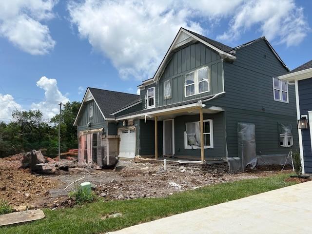 1070 Inez Dr, Smyrna, TN 37167 - view of front of property with board and batten siding and a porch
