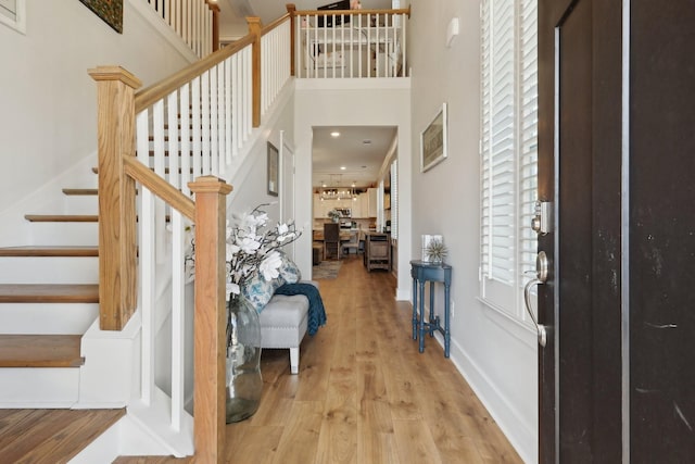 3617 Anthony Ave, Murfreesboro, TN 37129 - foyer entrance featuring wood finished floors, stairs, a high ceiling, and baseboards