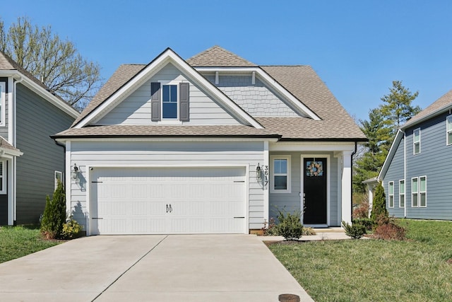 3617 Anthony Ave, Murfreesboro, TN 37129 - view of front of home featuring a shingled roof, driveway, a garage, and a front yard