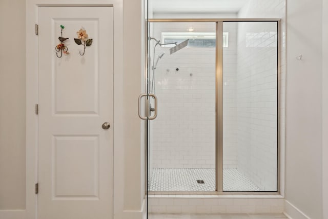 3617 Anthony Ave, Murfreesboro, TN 37129 - bathroom featuring a stall shower and baseboards