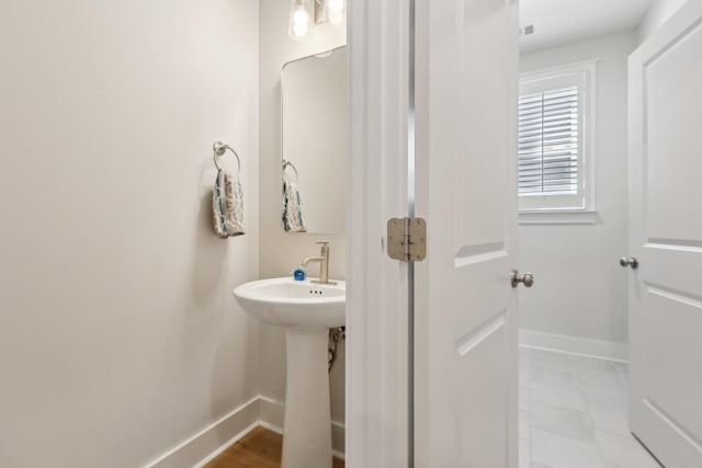 3617 Anthony Ave, Murfreesboro, TN 37129 - bathroom with baseboards and a sink