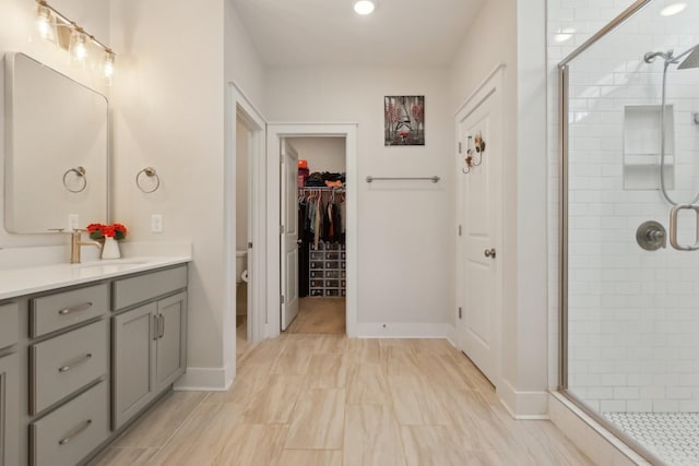 3617 Anthony Ave, Murfreesboro, TN 37129 - full bath with a stall shower, vanity, toilet, a walk in closet, and baseboards
