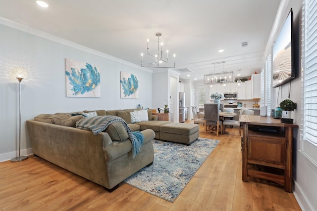 3617 Anthony Ave, Murfreesboro, TN 37129 - living room featuring a chandelier, light wood finished floors, crown molding, recessed lighting, and baseboards