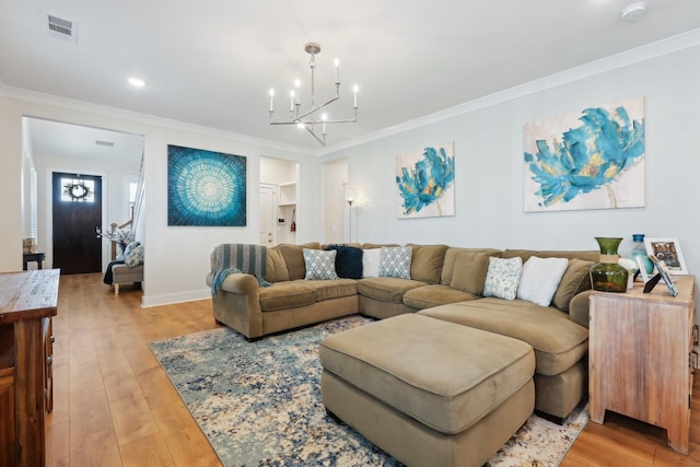 3617 Anthony Ave, Murfreesboro, TN 37129 - living room with crown molding, a chandelier, light wood-type flooring, and baseboards