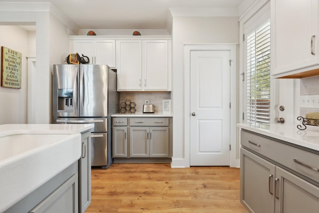 3617 Anthony Ave, Murfreesboro, TN 37129 - kitchen featuring stainless steel fridge, gray cabinets, tasteful backsplash, and light wood-type flooring