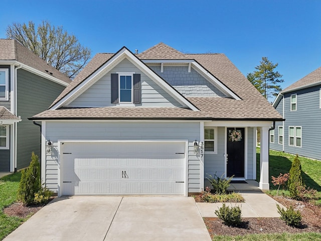 3617 Anthony Ave, Murfreesboro, TN 37129 - view of front of property featuring roof with shingles, an attached garage, and driveway