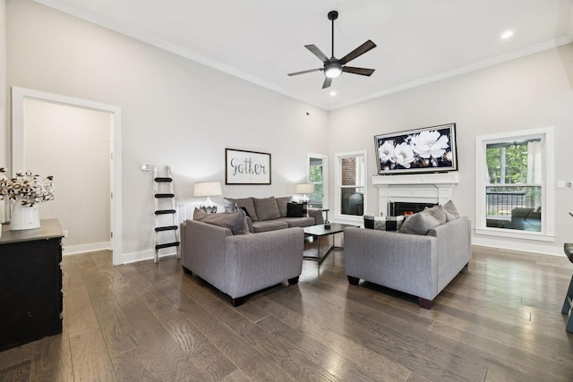 121 Regency Ln, Dickson, TN 37055 - living room featuring a ceiling fan, a lit fireplace, dark wood finished floors, recessed lighting, and baseboards