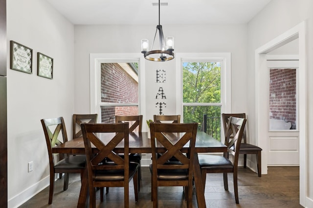 121 Regency Ln, Dickson, TN 37055 - dining room with a chandelier, dark wood-type flooring, and baseboards