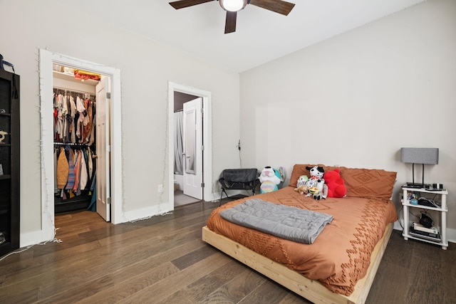 121 Regency Ln, Dickson, TN 37055 - bedroom with a spacious closet, wood finished floors, ceiling fan, a closet, and ensuite bath